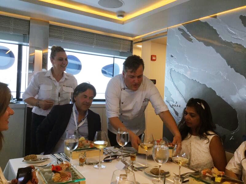 Chef Pano explaining the course at lunch during the 2017 Greek Yacht Show