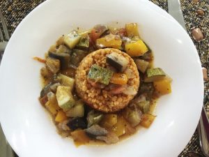 Vegetable Ratatouille served on spicy wheat risotto