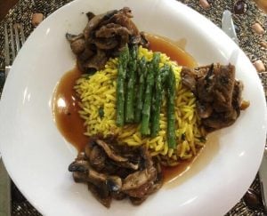 Marinated Mushroom Saffron Orzo with steamed asparagus and Mavrodafni wine sauce