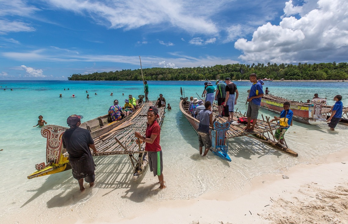 fishermen and tourists in New Guinea