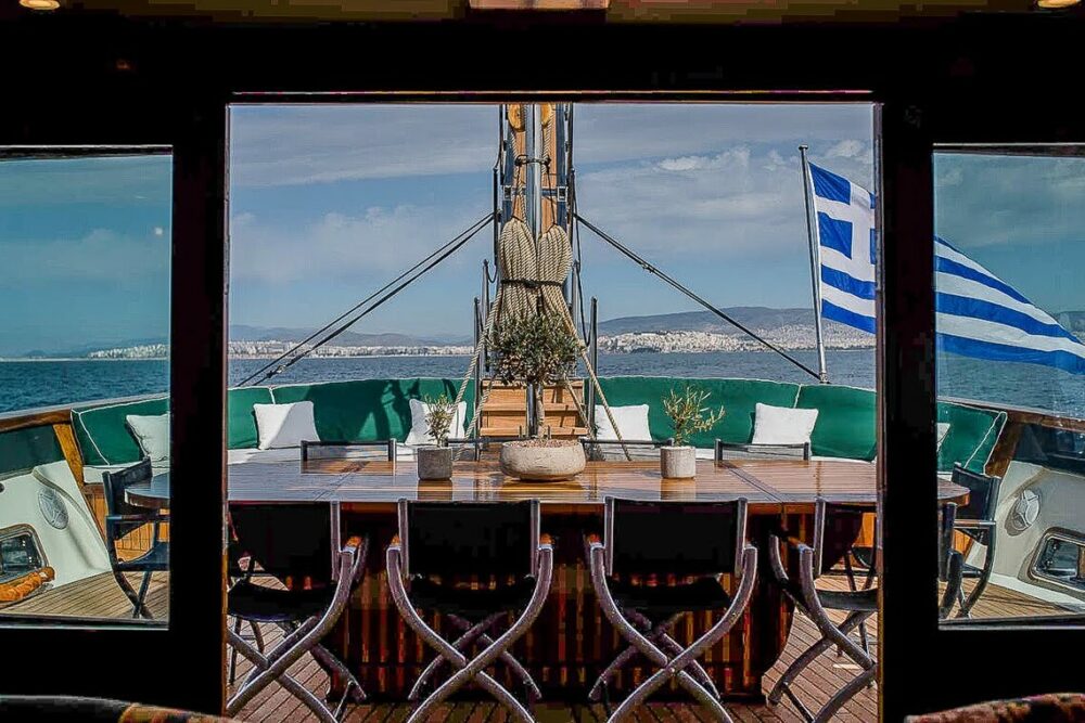 Greek wine/history yacht vacation. ARKTOS' exterior dining area.