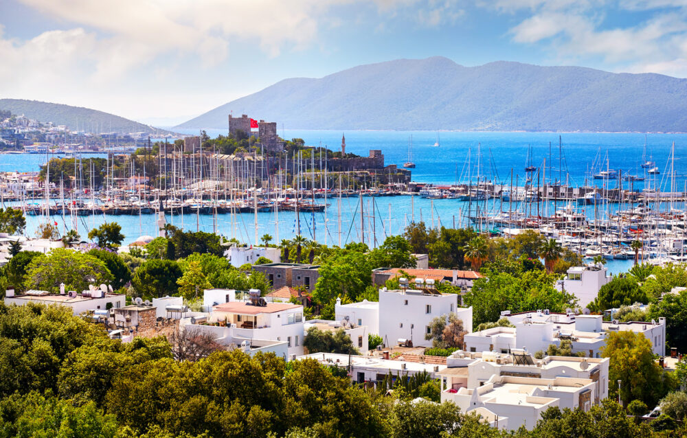 View of Bodrum castle and Marina Harbor in the Aegean sea in Turkey