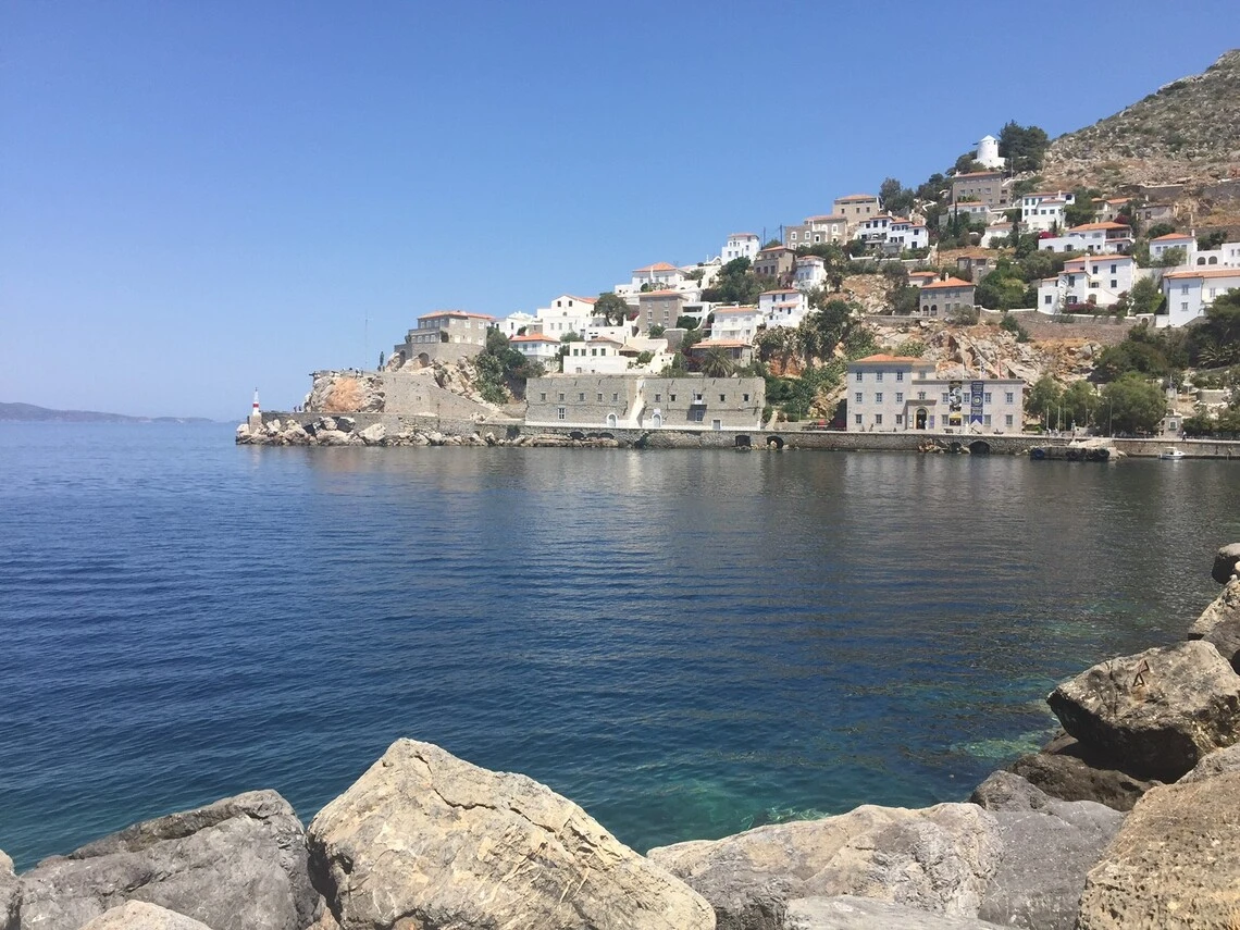 View of entrance to Hydra Harbor in Greece.
