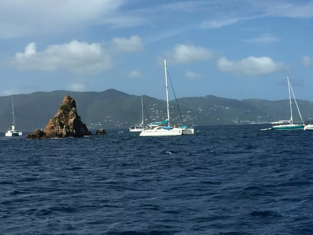 BVI Bali Crewed catamaran charter experience, at the Indians