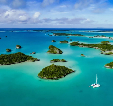 aerial view of several small tropical islands in Asia. You can visit on a luxury yacht charter.