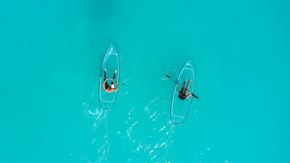 aerial shot of two people kayaking