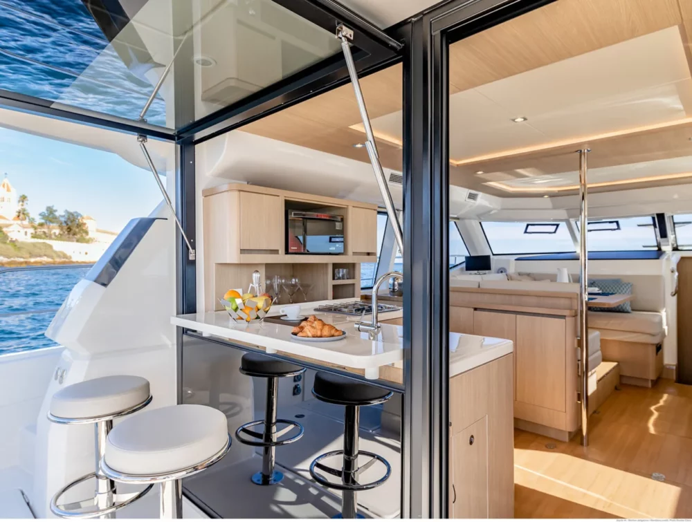 Interior with the exterior coming into the galley on the Powercat Aquila 44