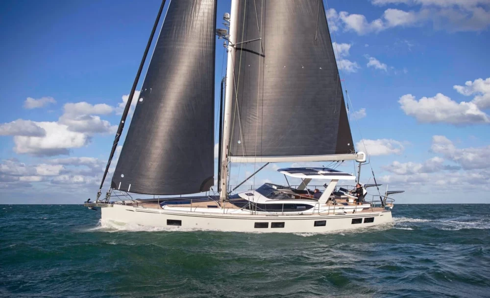 Vanishing Point, navigates crystal-clear waters on a private sailboat charter.